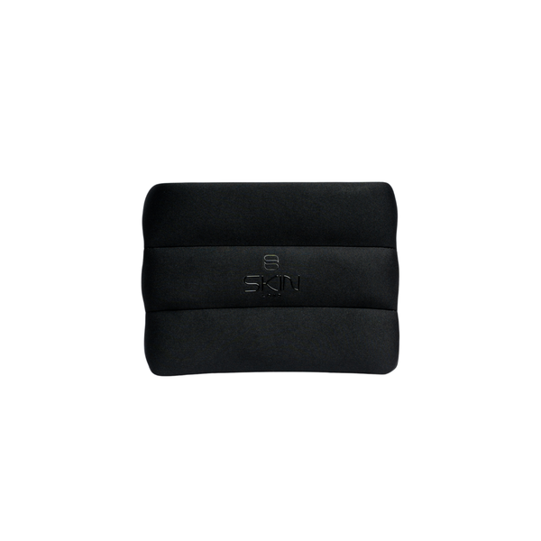 Skin Load Makeup Pouch in black padded neoprene, front view with embossed Skin Load logo